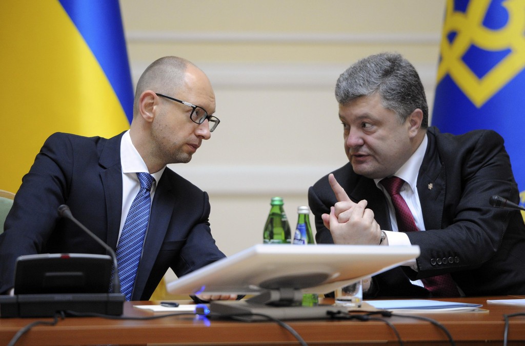 Ukrainian President Poroshenko talks with Prime Minister Yatseniuk in Kiev